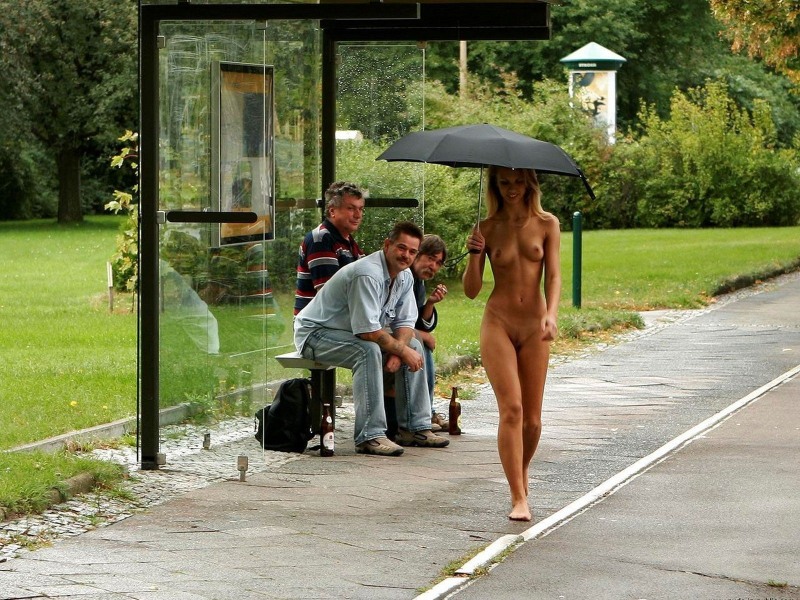 Naked woman walks on the street