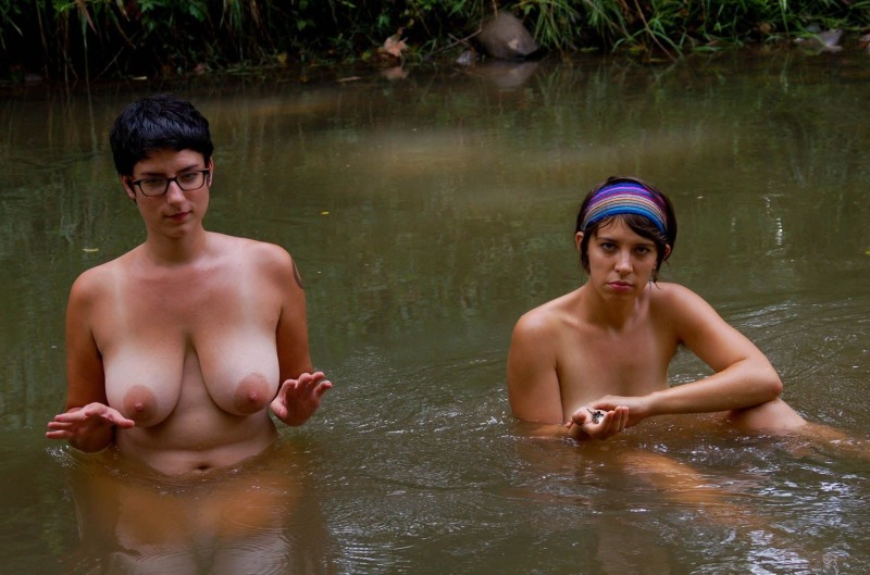 Women swim in the river naked