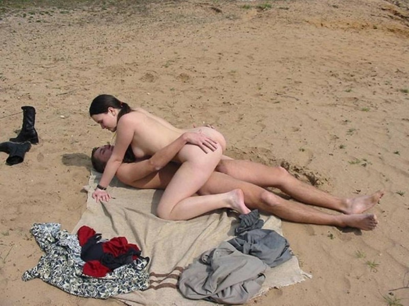 Naked exhibitionists on the beach