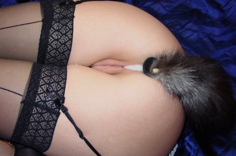 Naked girl with anal tail