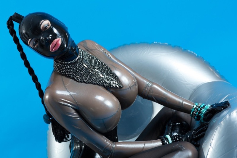 Milena Velba in a latex suit