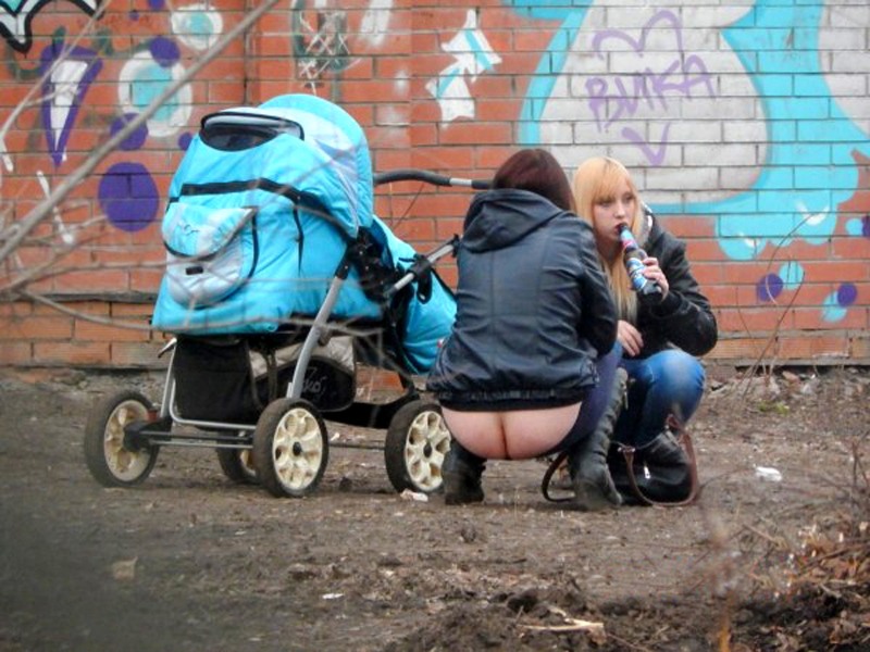 Naked mothers with strollers