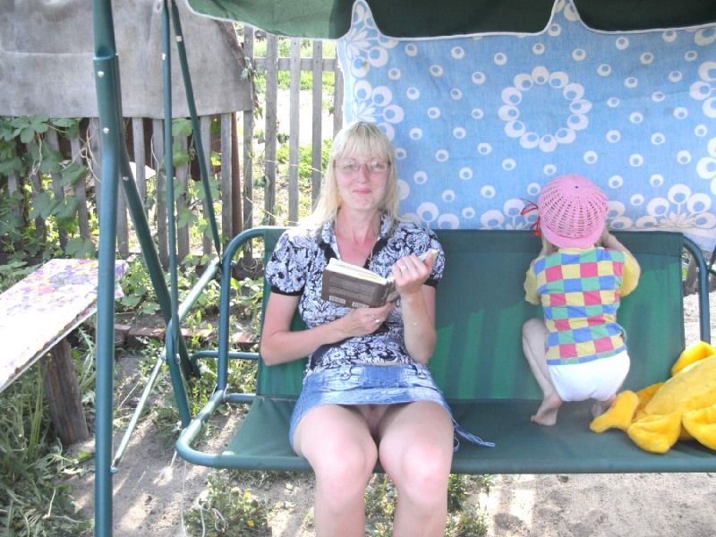 Naked women on a bicycle