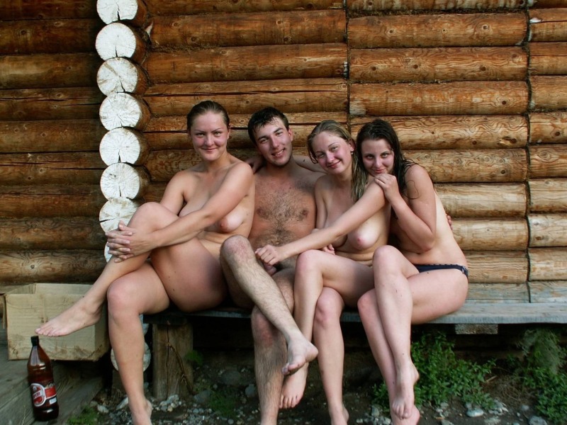 Naked women in a bathhouse with men