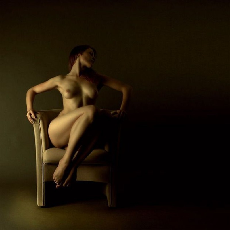Artistic nude in a chair