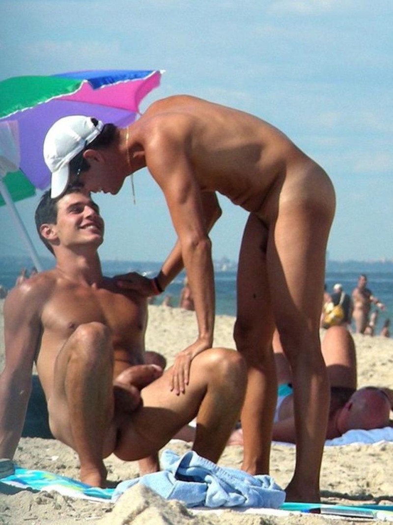 Naked guys on a crowded beach