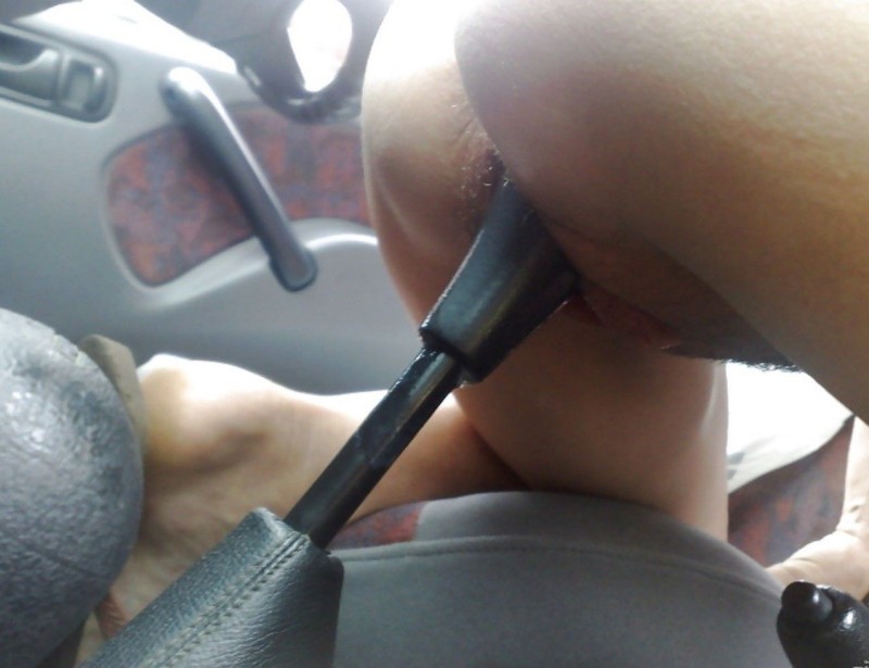 Naked women in the car on a lever