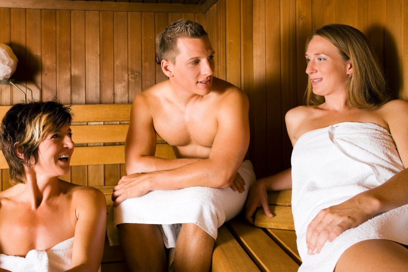 Woman and boy in the sauna