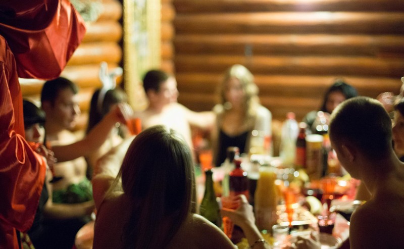 In a sauna with colleagues