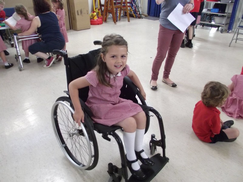 A child in a wheelchair