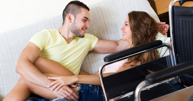 Girl in the disabled with her husband on the couch