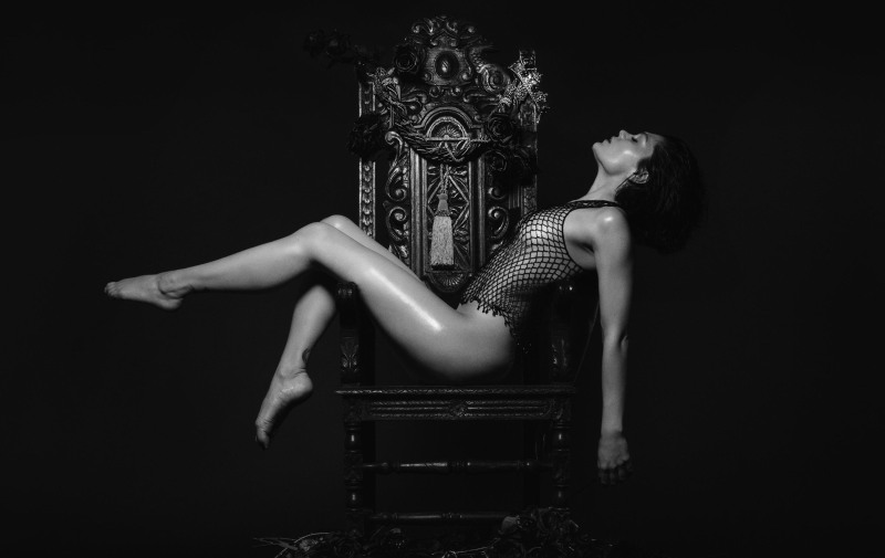 Jesse Jay on the neck of the guy sat down