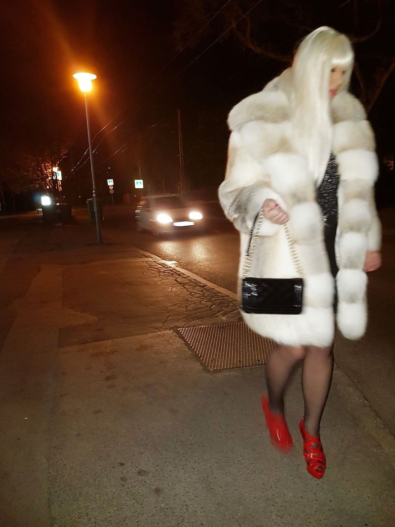 Related girls in fur coats