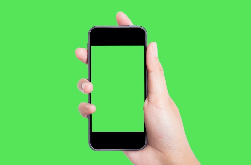 Smartphone in the hand of chromakey