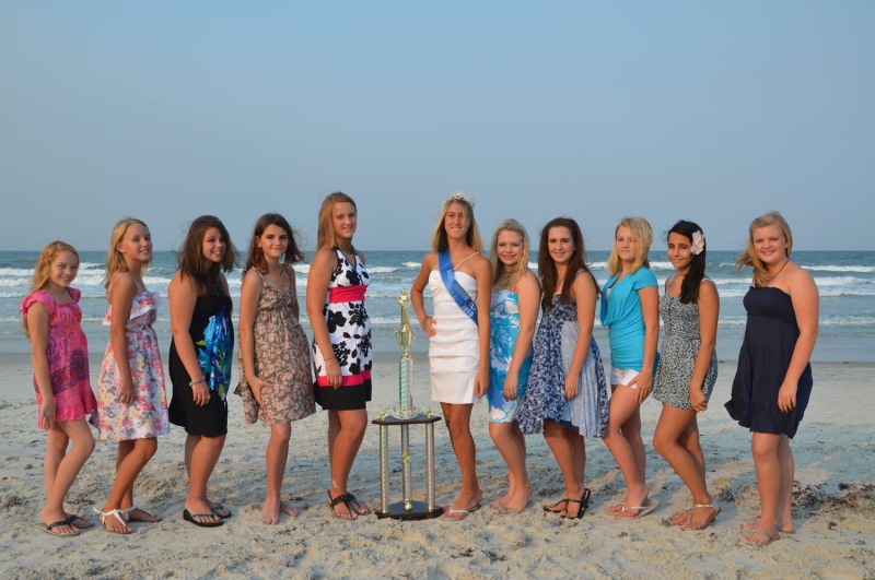 A very small nudist bathes