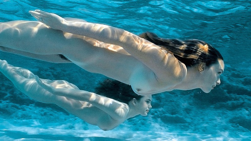 Naked girls in water