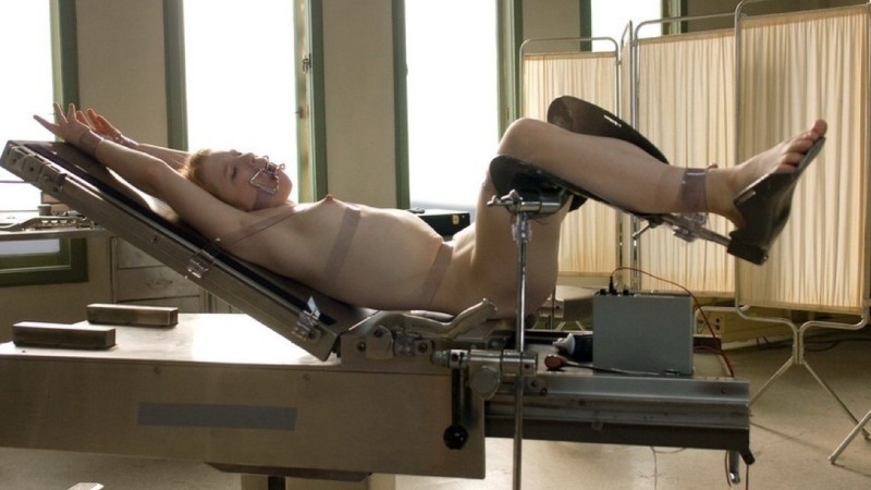 Naked women in a gynecological chair hidden
