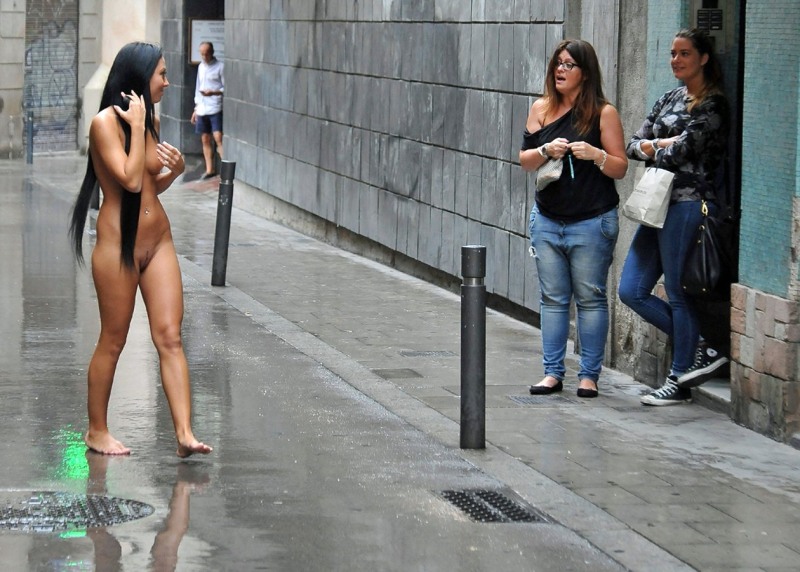 Woman undresses in public
