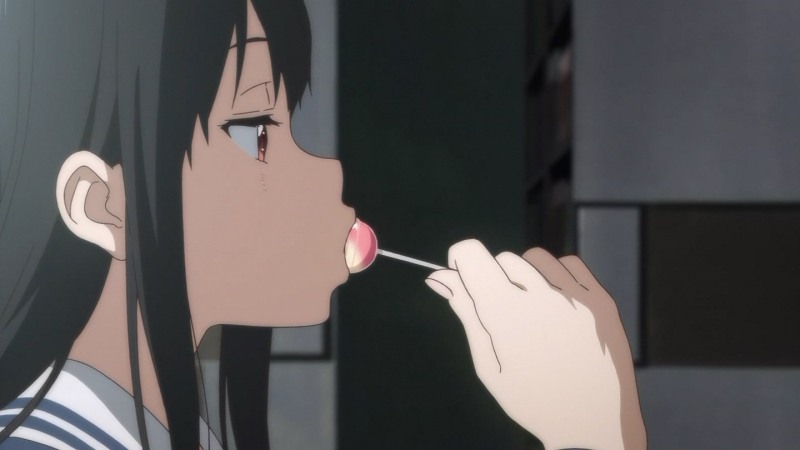 The girl licks ice cream