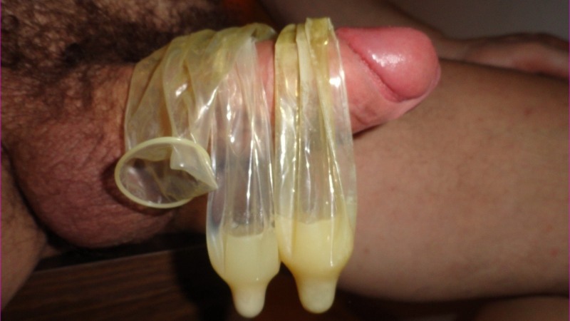 A man cums in a condom