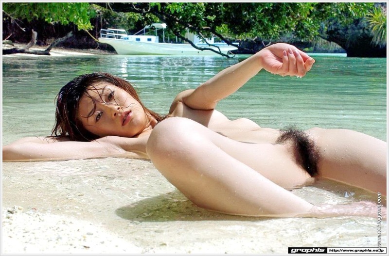 Naked hairy Asian on the beach