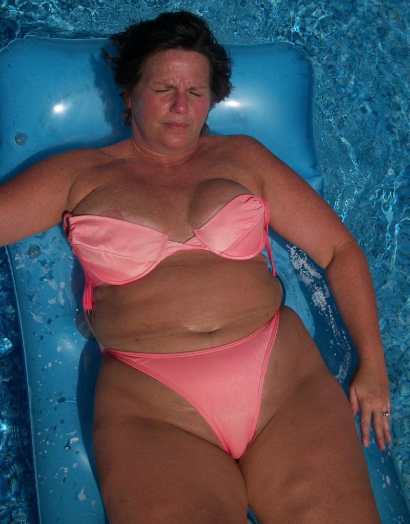 Woman 35 years old with overweight photo in a swimsuit