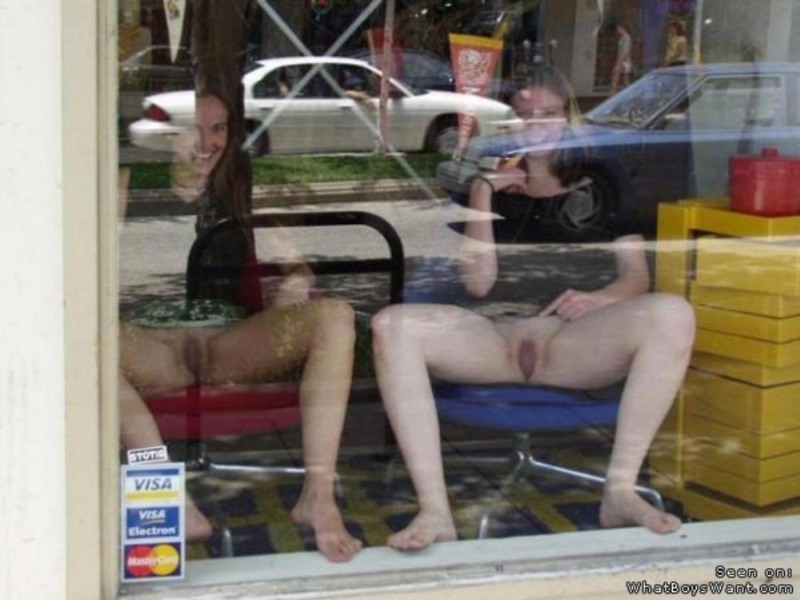 Peeping out the window behind the neighbor