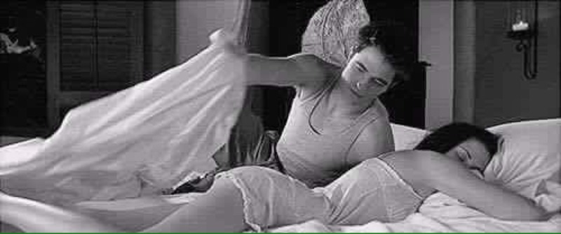 The guy settles the girl to sleep