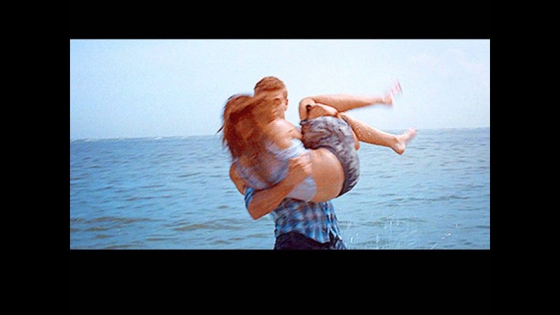 A man is circling a girl in her arms