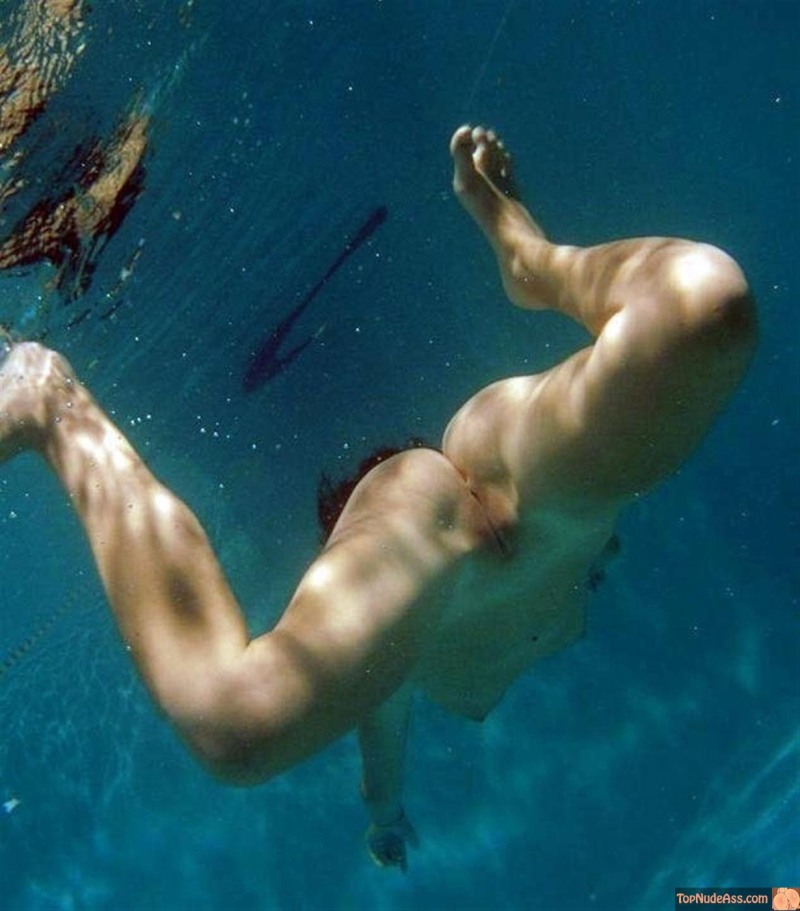 Lesbian underwater with scuba dummy