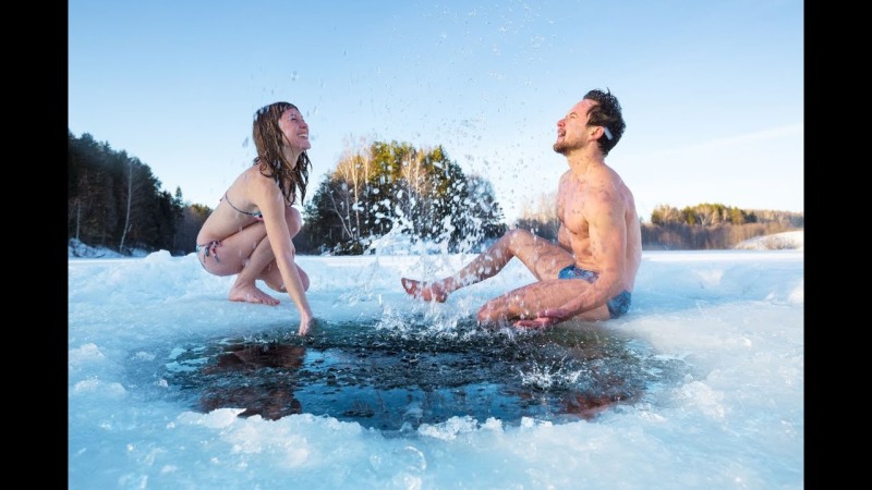 Young Man Swimming Ice Bath