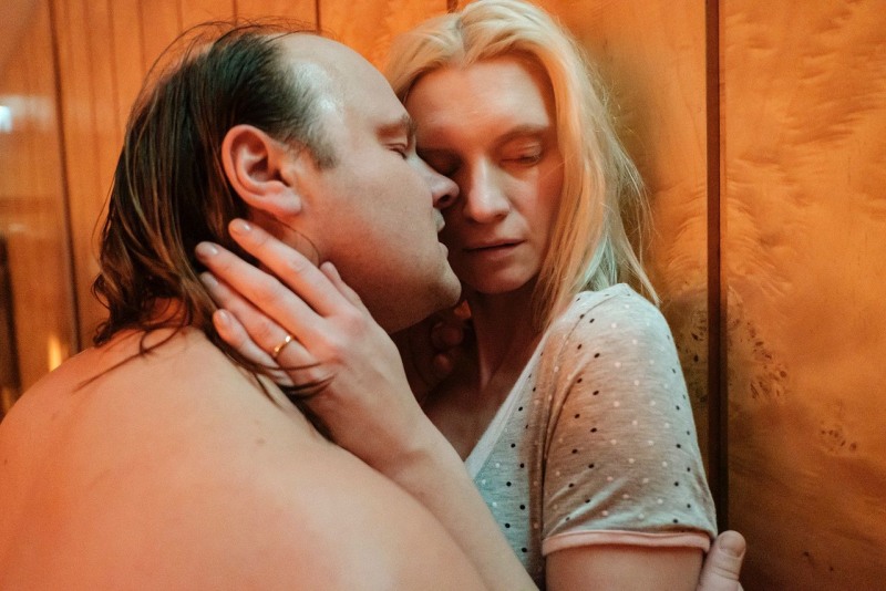 Naked young blonde with a square