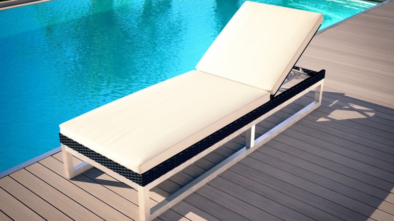 Girl on a sun lounger by the pool