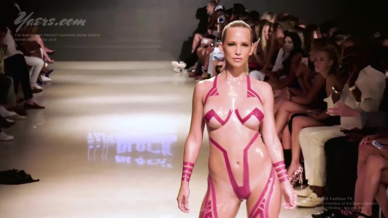 Fashion show with bare breasts
