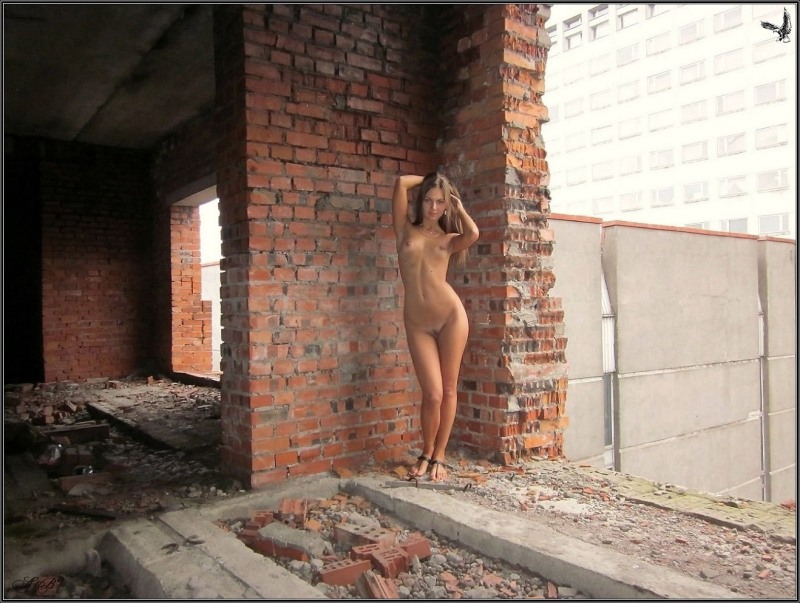 Naked girls at a construction site